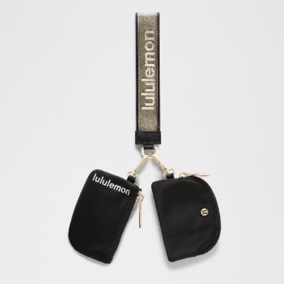 NWT Lululemon dual pouch wristlet/ pouch in black & gold wordmark